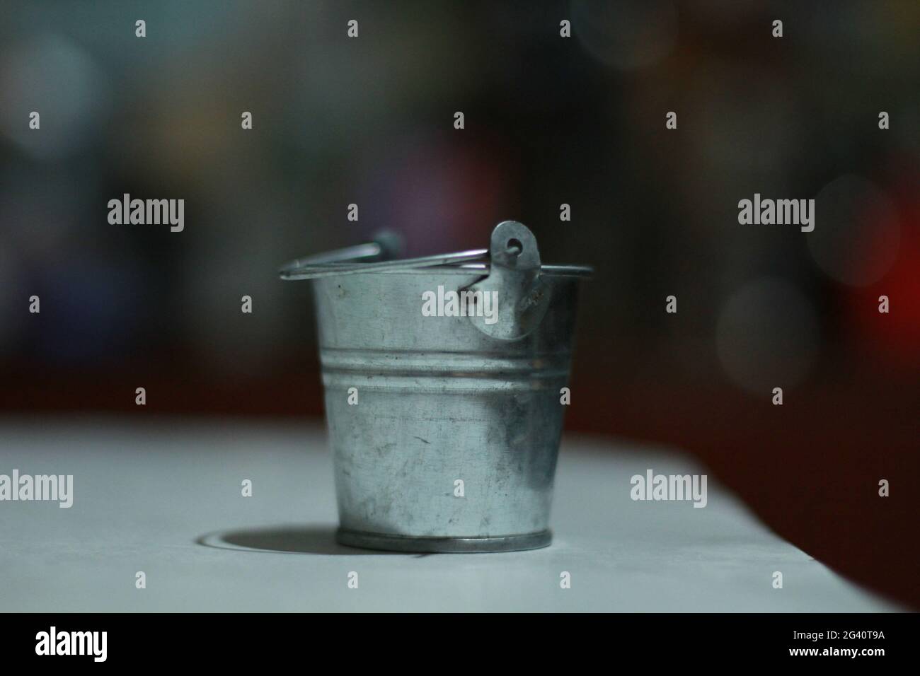 small iron bucket close-up on the table Stock Photo