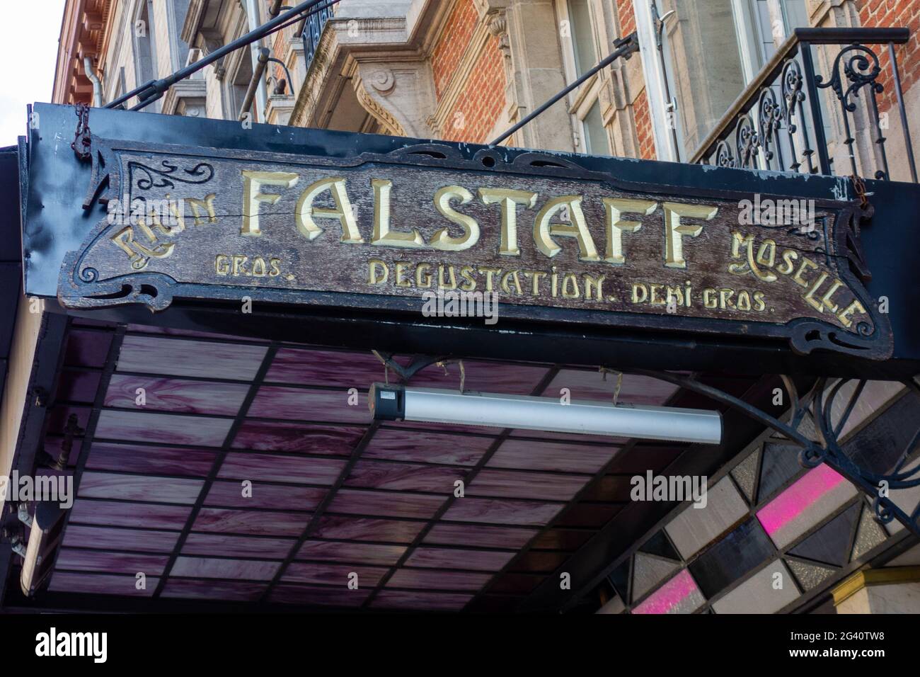 Brussels, Belgium, June 16, 2021. Logo of the famous brasserie restaurant Le Falstaff on the terrace in the center of Brussels. Stock Photo