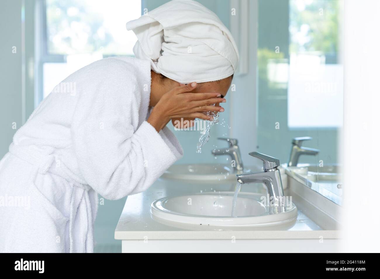One woman washing face mask hi-res stock photography and images - Alamy