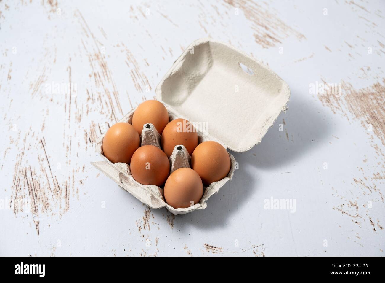 Egg cup with half a dozen eggs organic eggs from free range hens stock