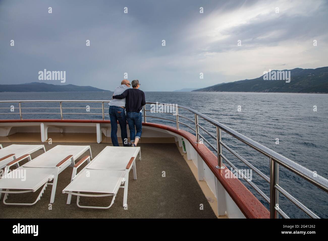 Couple on deck of cruise ship, near Opatija, Primorje-Gorski Kotar, Croatia, Europe Stock Photo