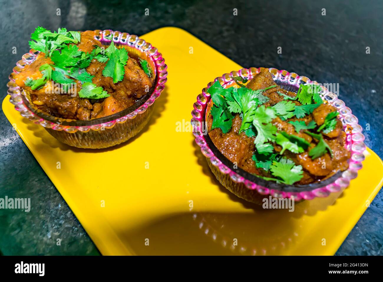 home made making spicy masala chicken in indian style close view