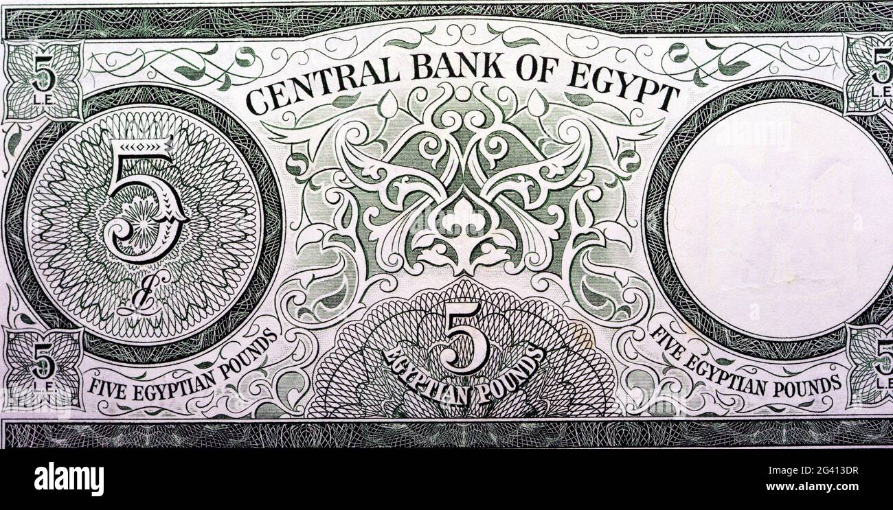 old Five Egyptian pounds banknote 5 LE Issue year 1963 with an image of the pharaoh Tutankhamen on the right and guilloche at bottom center, Leftover Stock Photo