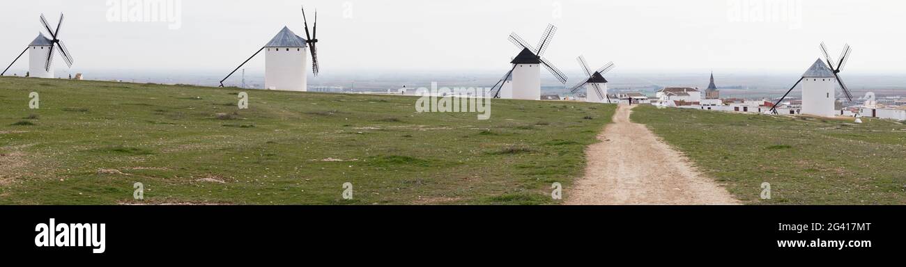 Panorama view of the historic white windmills of La Mancha above the town of Campo de Criptana Stock Photo