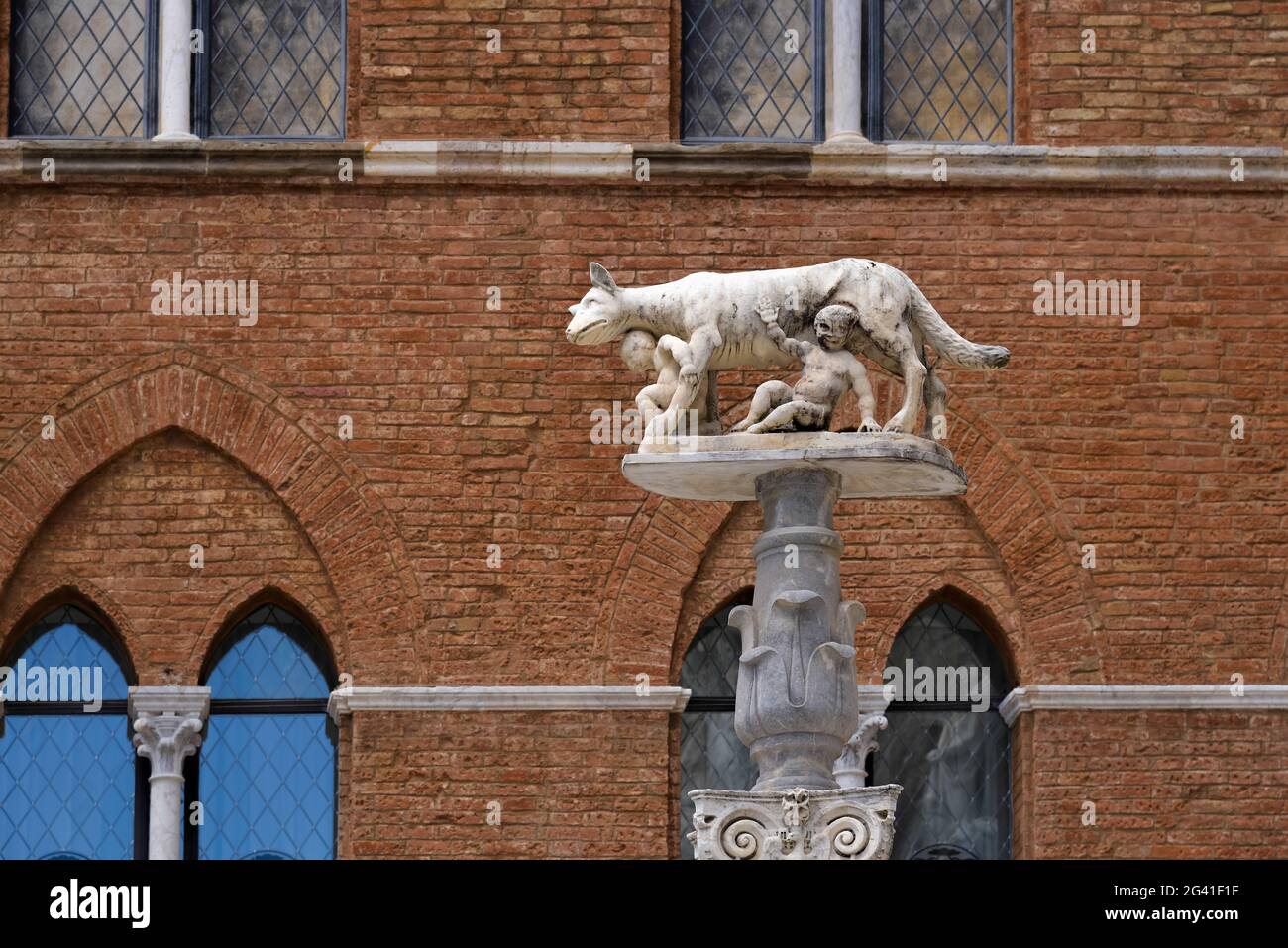 She-wolf suckling infants Romulus and Remus near Sienna Cathedral Stock Photo