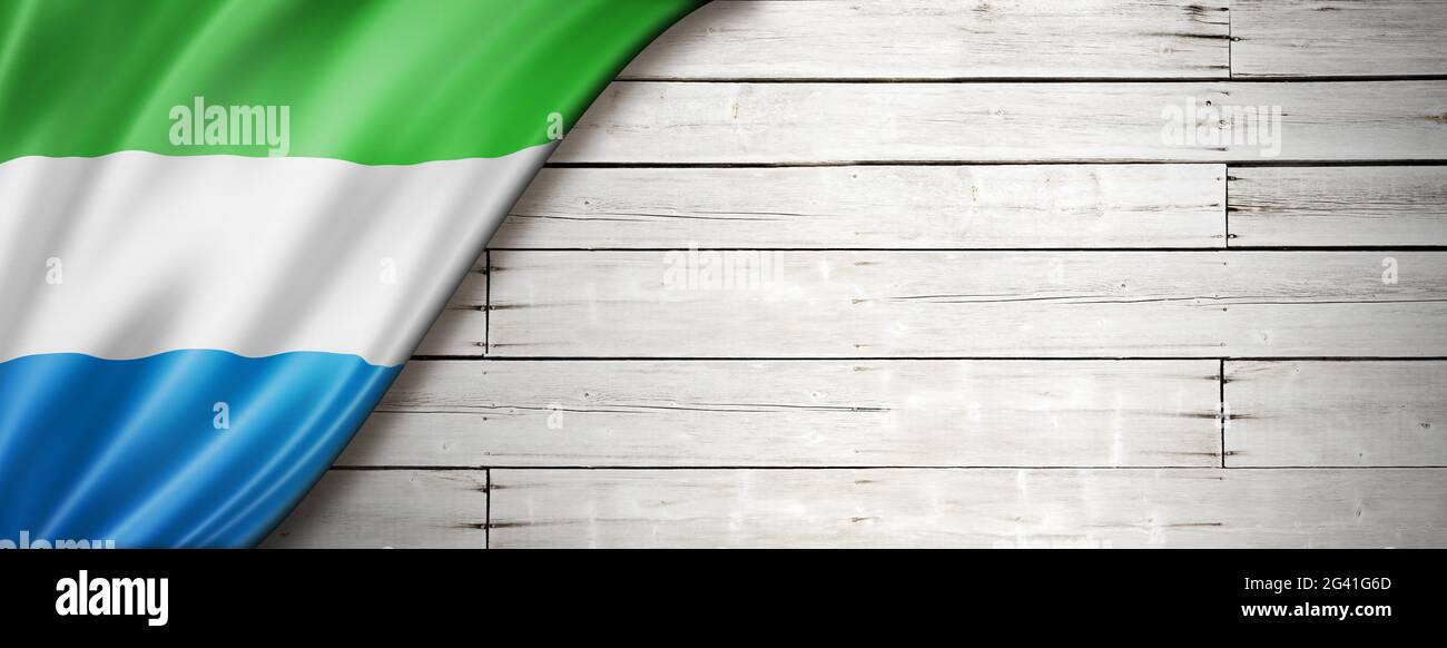 Sierra Leone flag on old white wall banner Stock Photo - Alamy