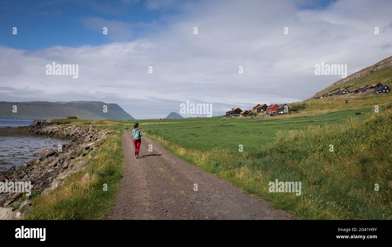 Woman walks on pathway in hi-res stock photography and images - Alamy