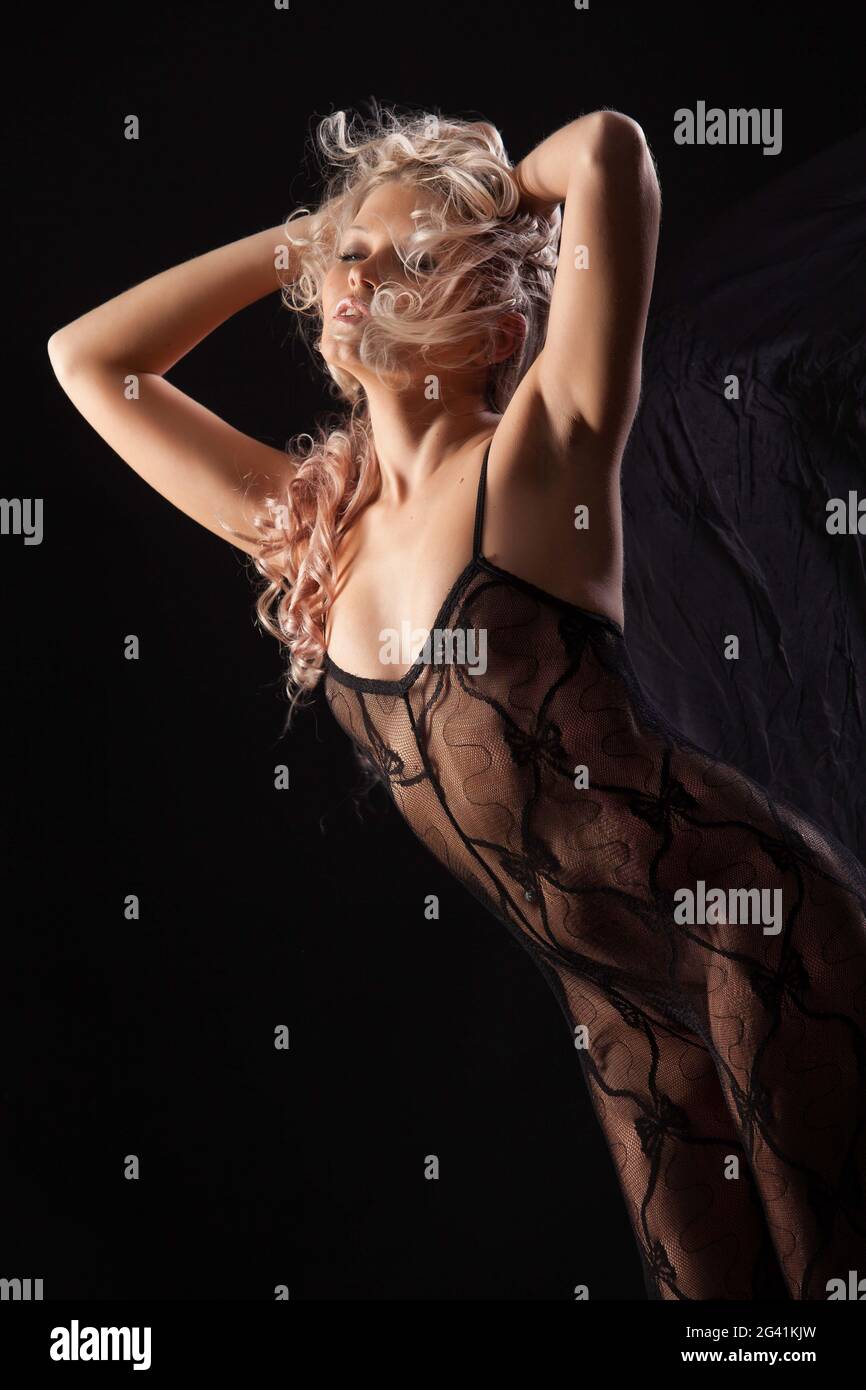 Young Woman In A Black Lingerie Stock Photo