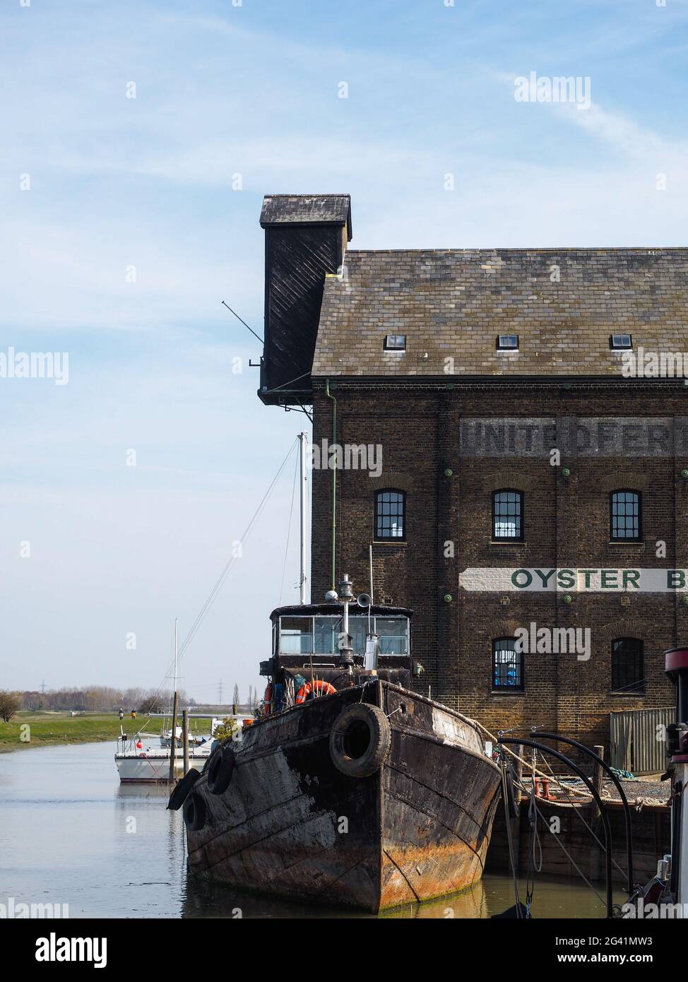 FAVERSHAM, KENT/UK - MARCH 29 : Boats moored on the Swale in Faversham Kent on March 29, 2014 Stock Photo