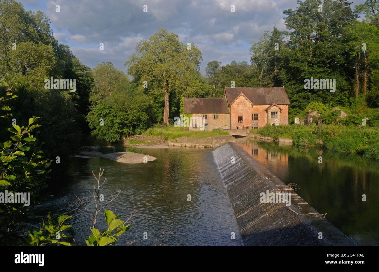Derelict watermill on the River Teme at Bromfield, Shropshire, England Stock Photo