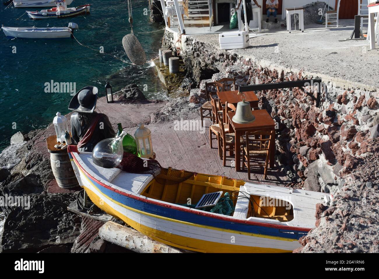 Romantic Taverna in Ammoudi Bay on Santorini Stock Photo