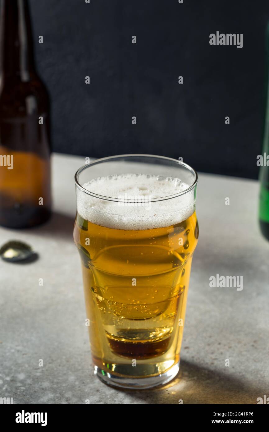 Korean Cojinganmek Soda Soju Beer Bomb in a Pint Glass Stock Photo