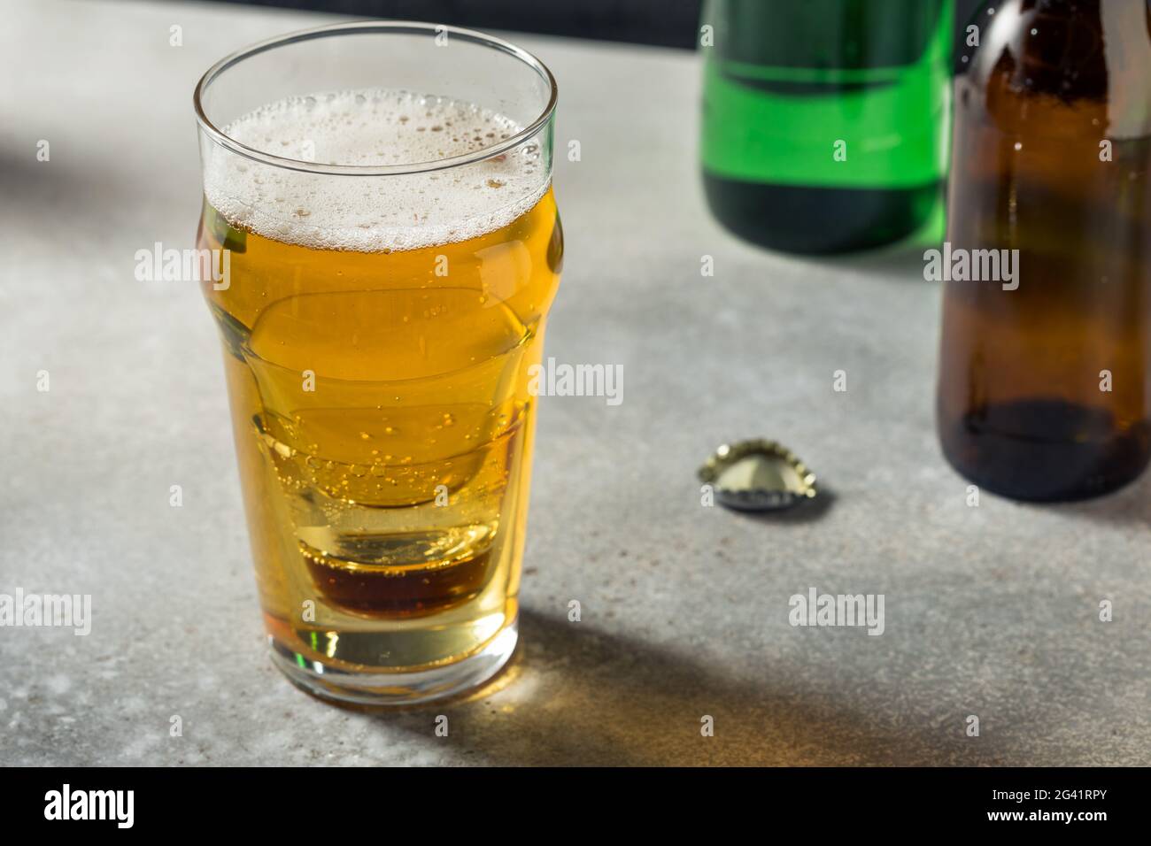 Korean Cojinganmek Soda Soju Beer Bomb in a Pint Glass Stock Photo