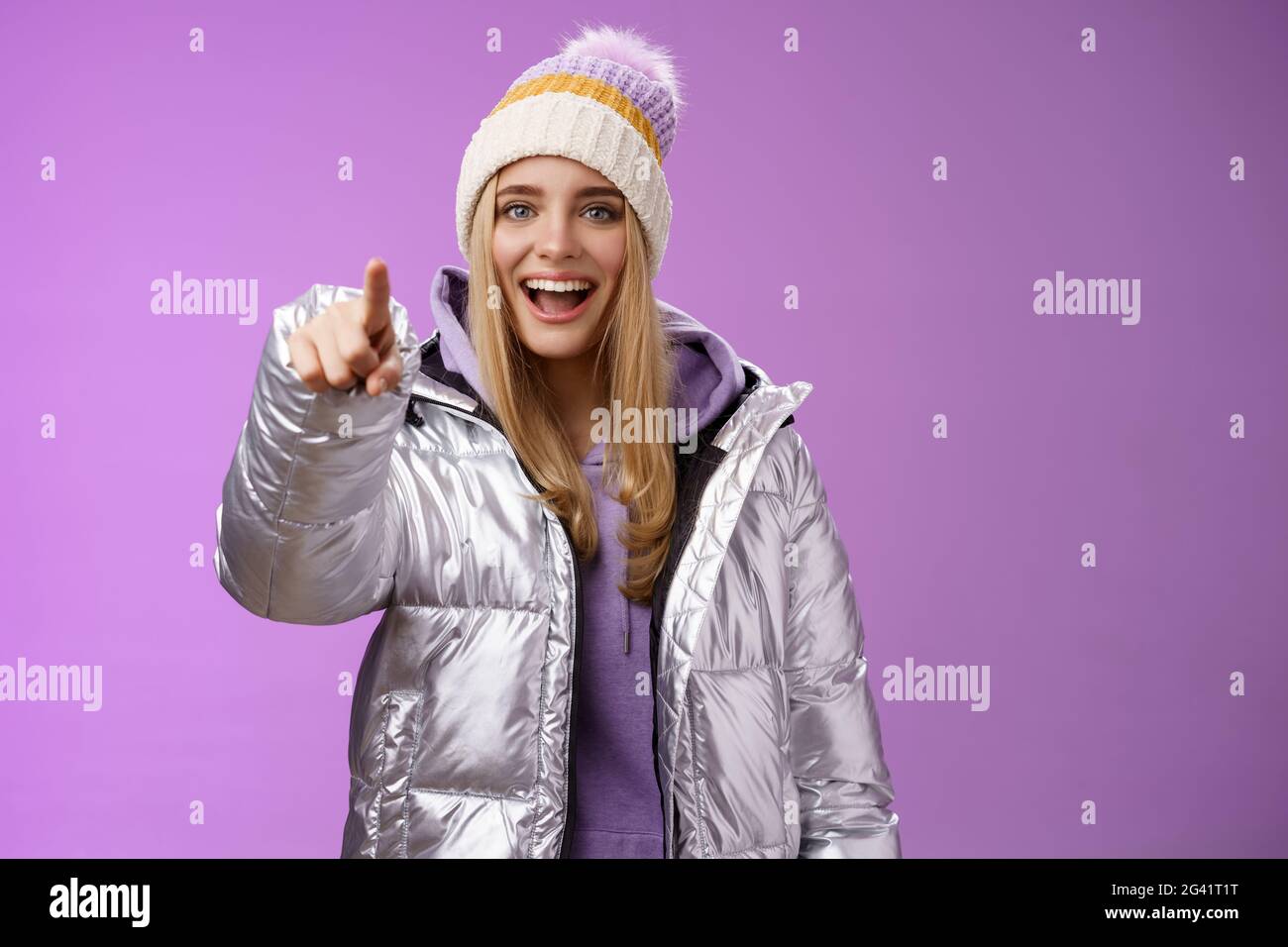 Girl make fun of clumsy friend pointing finger cruel ignorant laughing over funny amusing situation indicating camera standing h Stock Photo