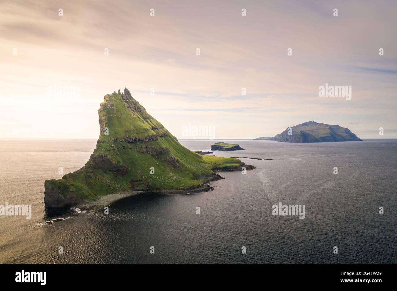 Tindholmur Island and Mykines at sunset, Faroe Islands Stock Photo - Alamy