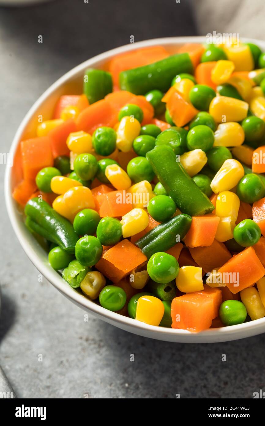 Healthy Steamed Mixed Vegetables with Peas Corns and Carrots Stock