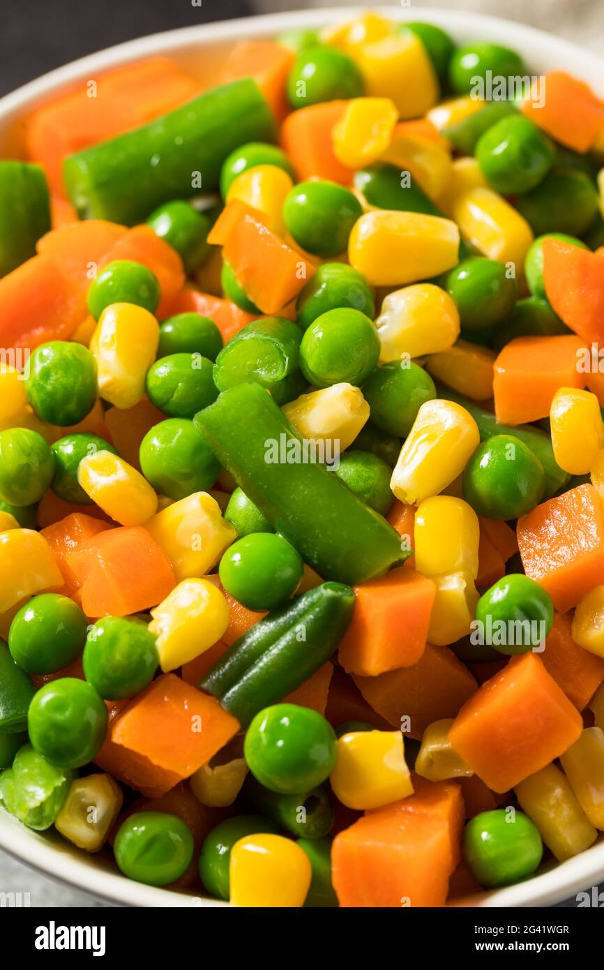 Healthy Steamed Mixed Vegetables with Peas Corns and Carrots Stock