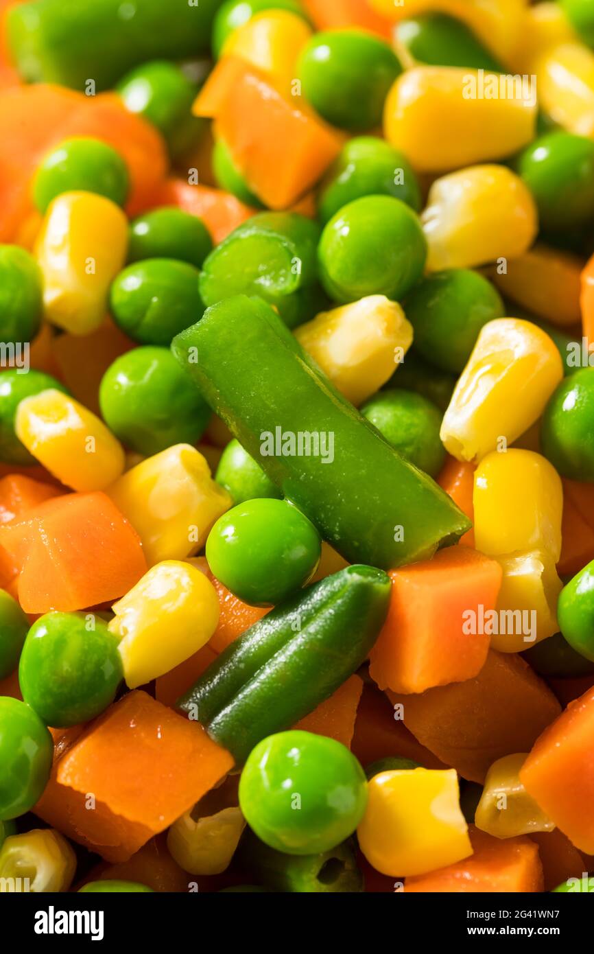 Healthy Steamed Mixed Vegetables with Peas Corns and Carrots Stock