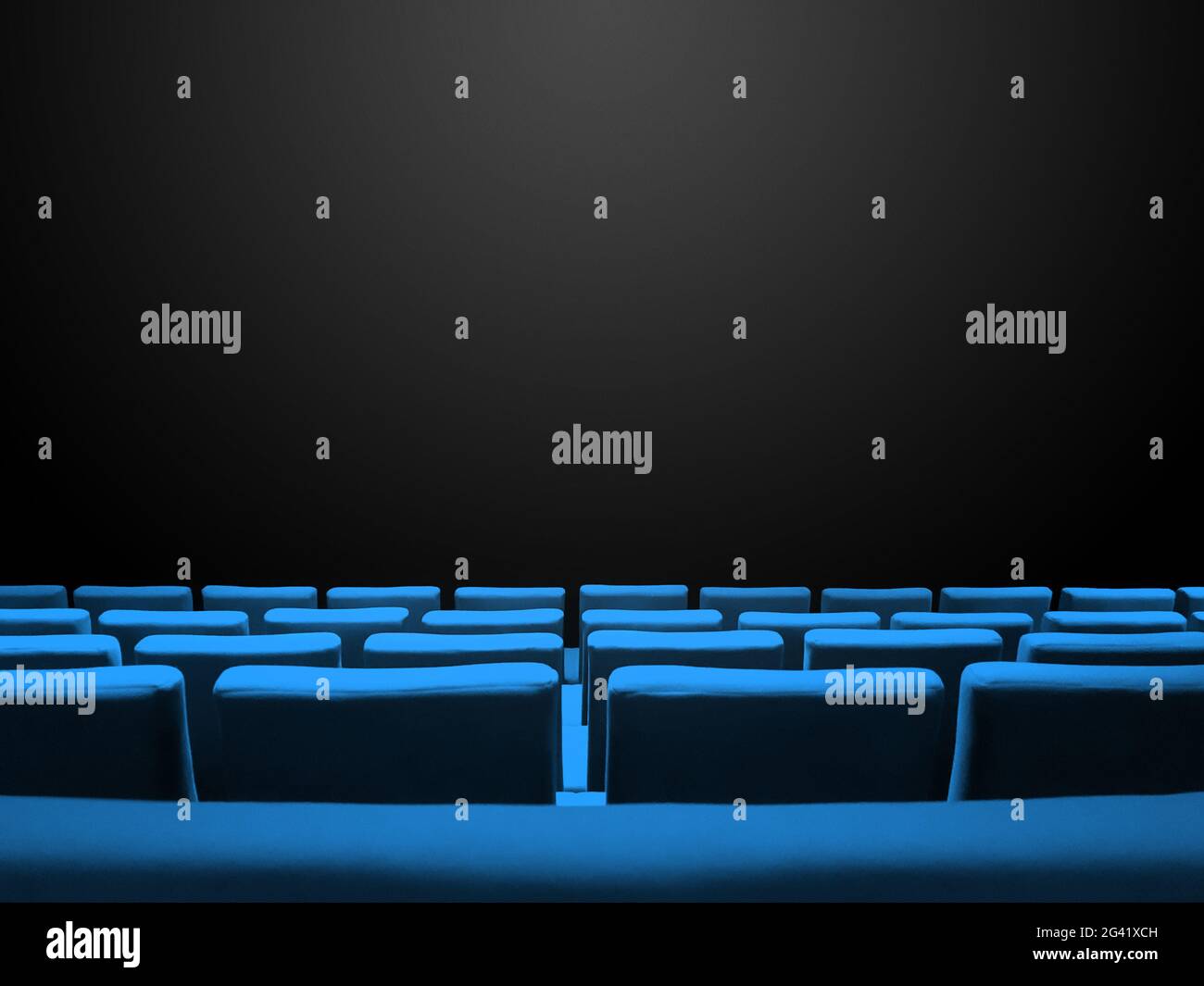 Cinema movie theatre with blue seats rows and a black background Stock