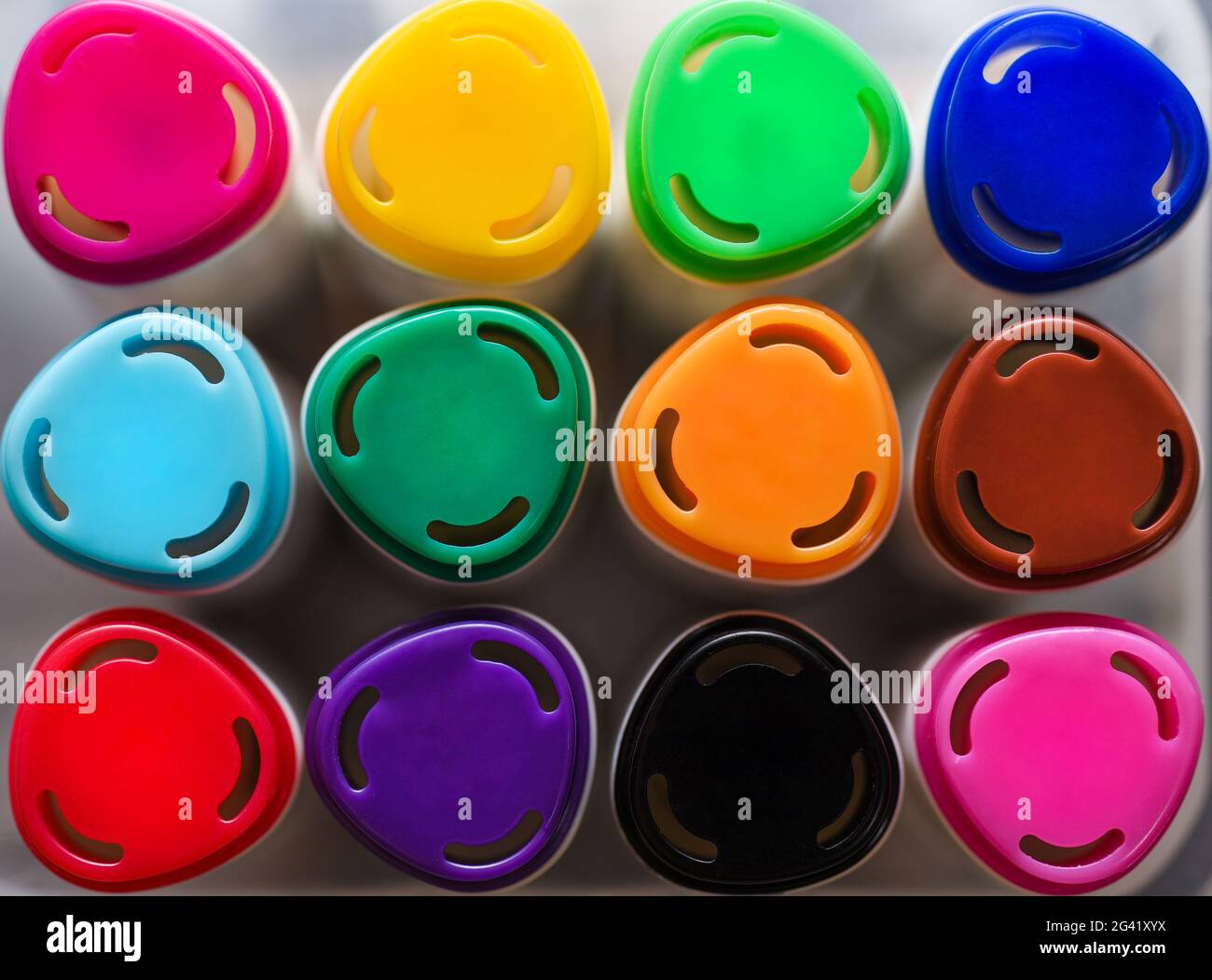 Colored markers for drawing on a white background, close-up. Stock Photo