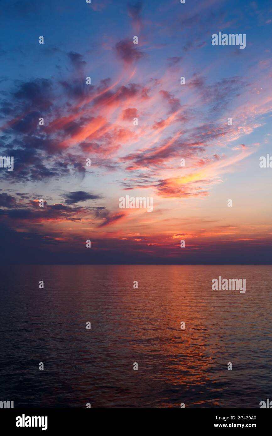 A stunning pink and orange sunset sky in the middle of Mediterranean ...