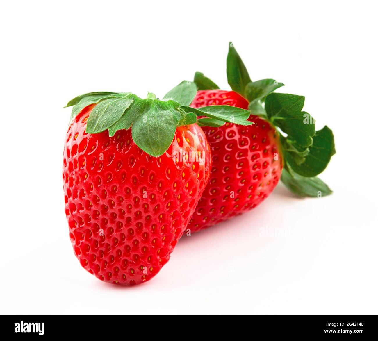 Ripe red strawberry on an isolated white background Stock Photo - Alamy