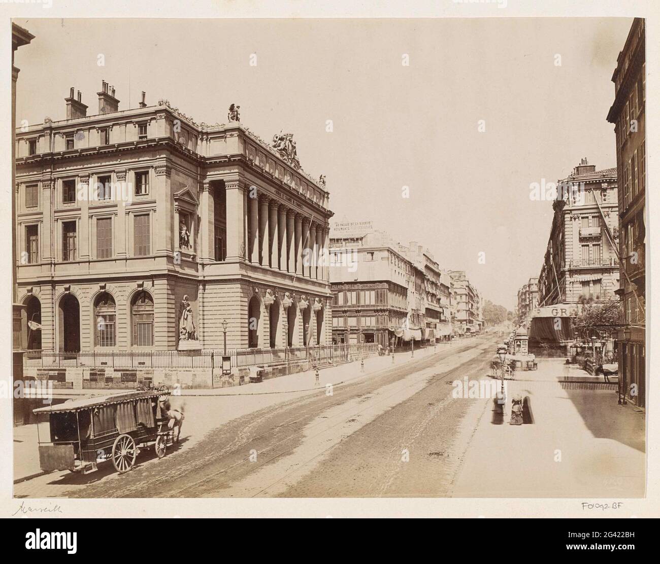 La Canebière in Marseille with the Palais de la Bourse and a horse ket