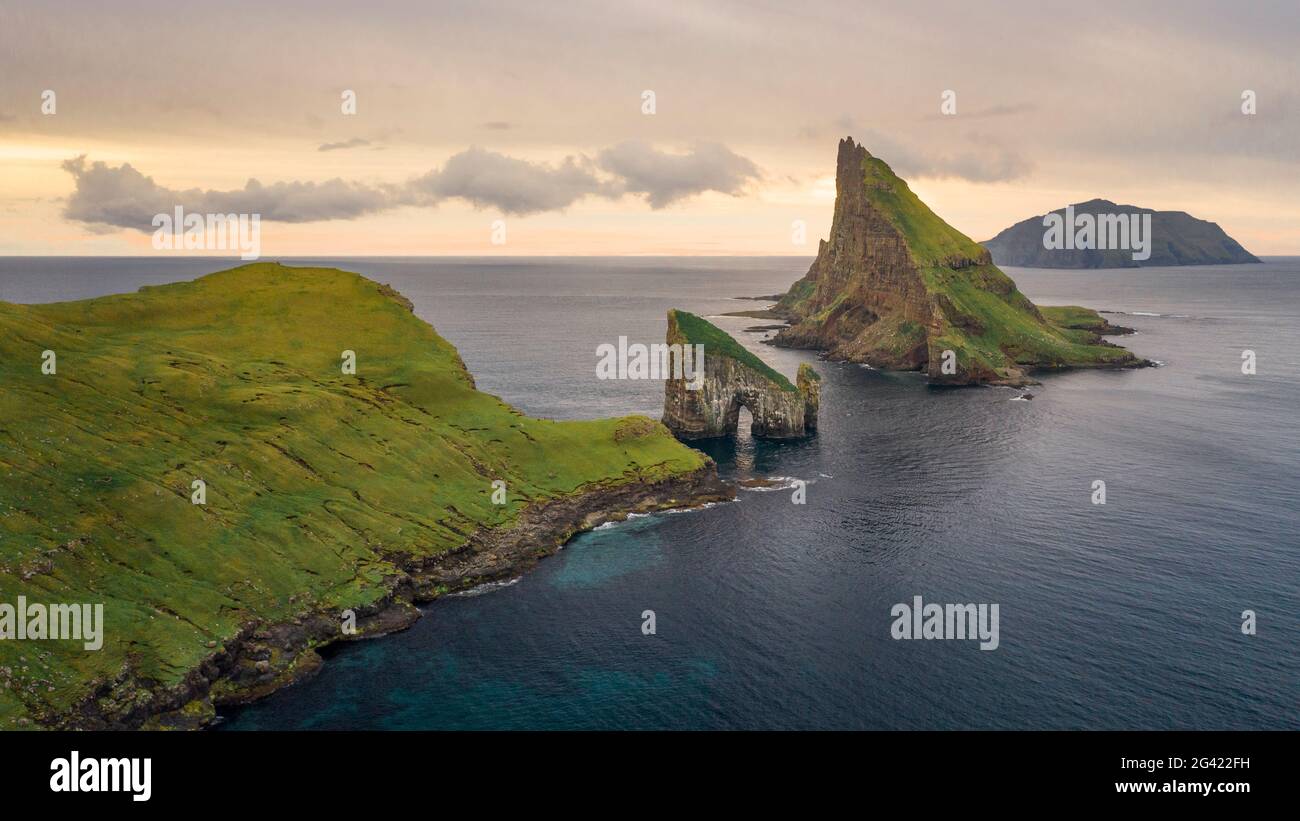 Rock formations of Drangarnier and Tindholmur Island and Mykines in ...