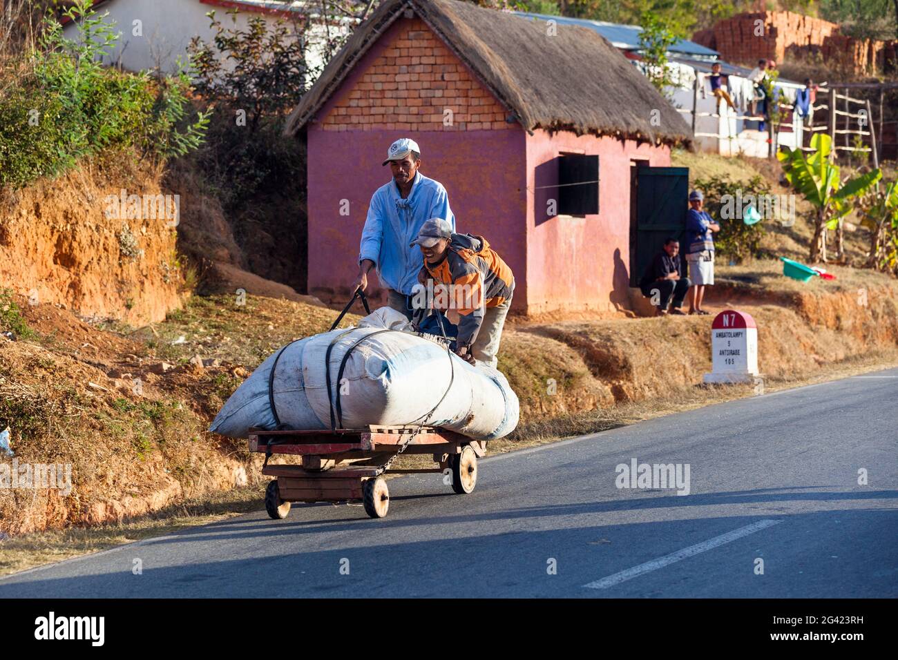 Malagasy people with cart, Madagascar, Africa Stock Photo