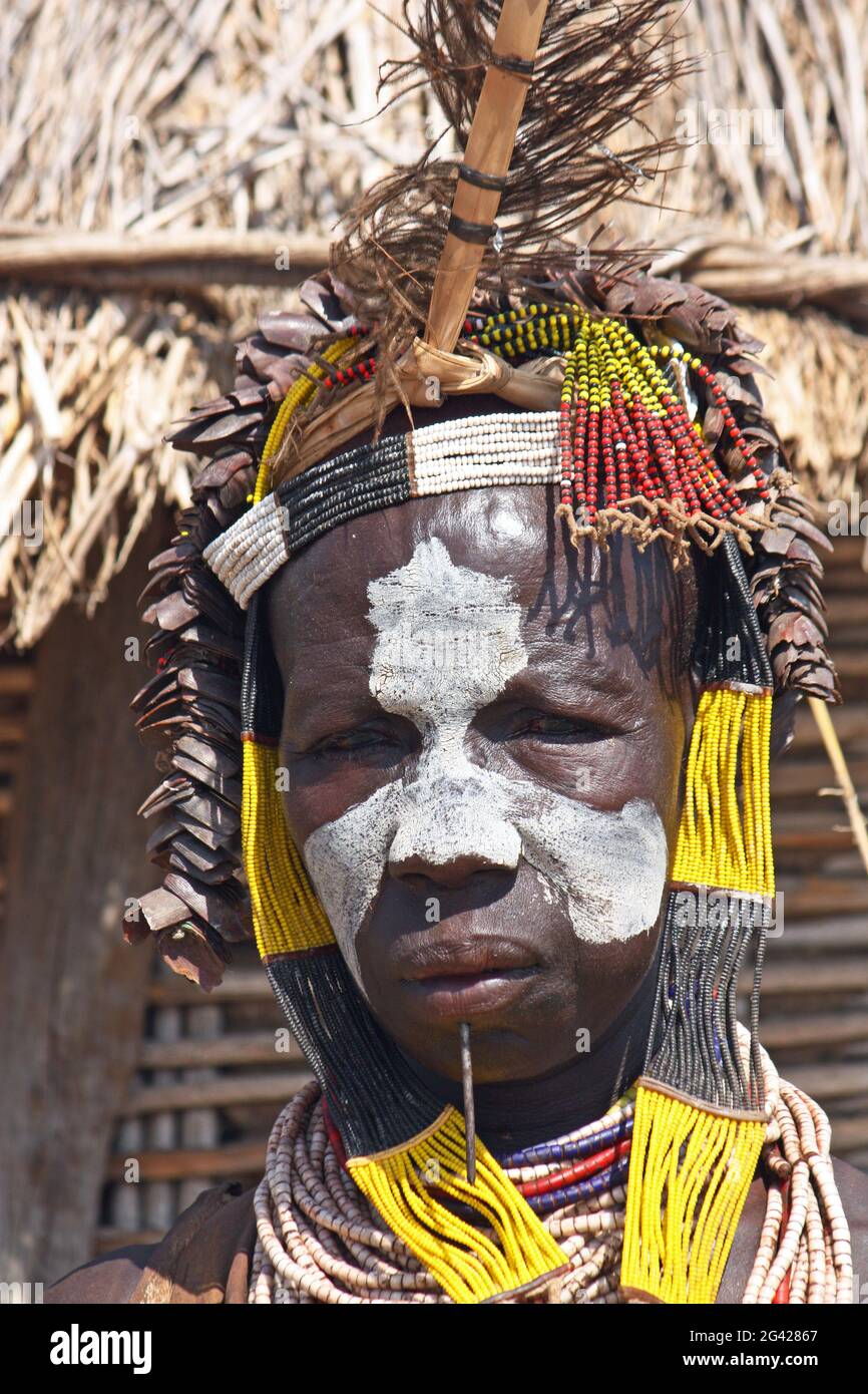Ethiopia; Southern Nations Region; southern Ethiopian highlands; Kolcho village on the Omo River; Karo woman with headdress and face-paint; Stock Photo