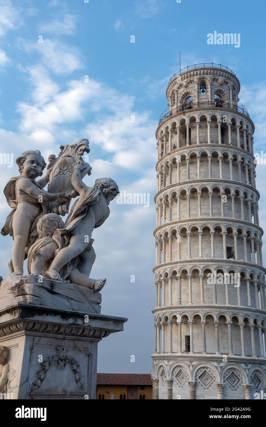 PISA, TUSCANY/ITALY  - APRIL 17 : Statue of cherubs in front of the Leaning Tower of Pisa Tuscany Italy on April 17, 2019. Three Stock Photo