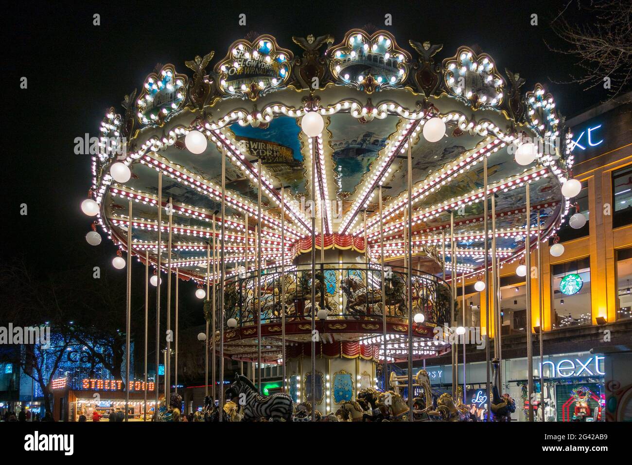 CARDIFF, WALES/UK - DECEMBER 15 : Carousel at Christmas in Cardiff Wales on December 15, 2018. Unidentified people Stock Photo