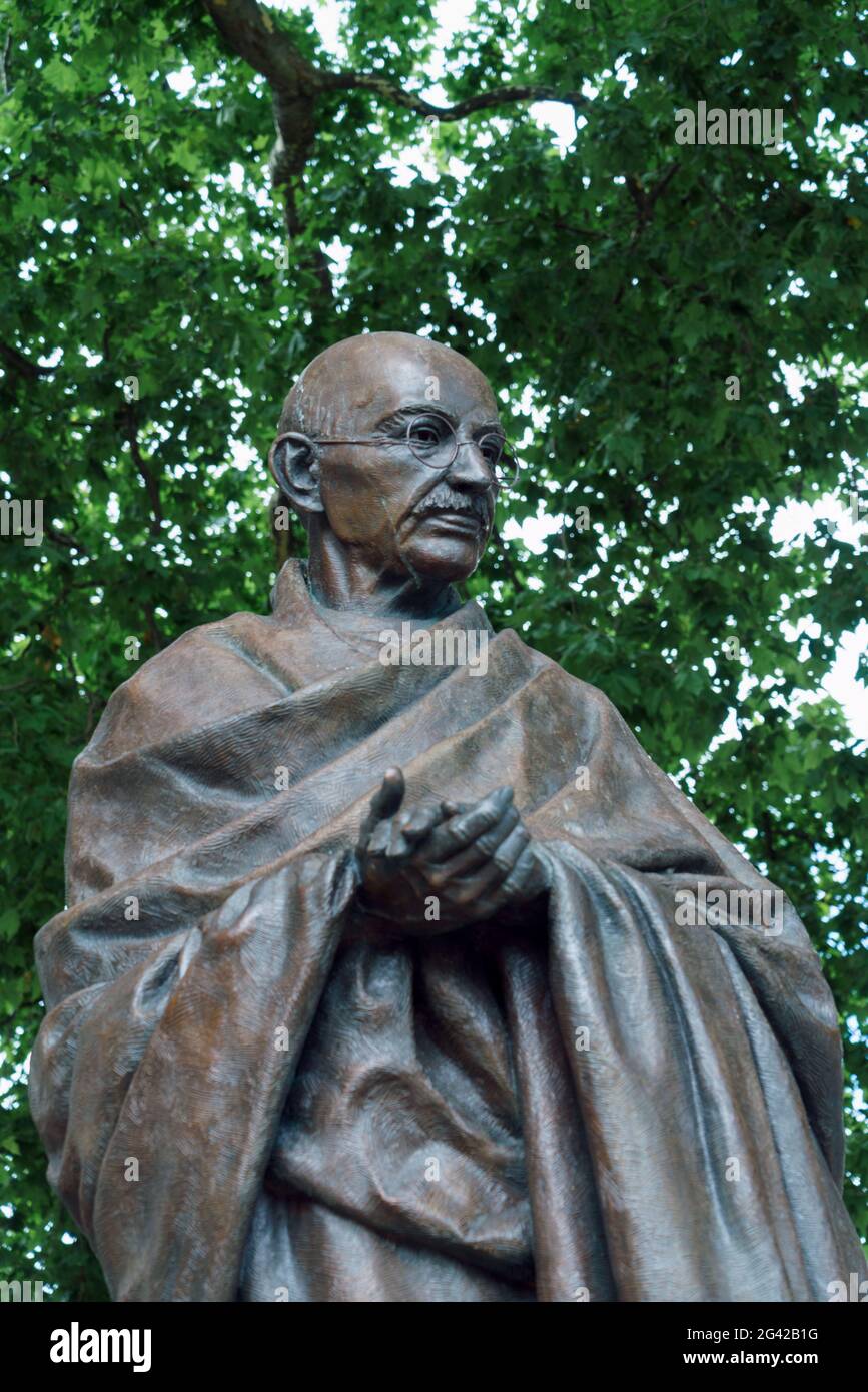 LONDON - JULY 30 : Statue of Mahatma Ghandi in Parliament Square London on July 30, 2017 Stock Photo