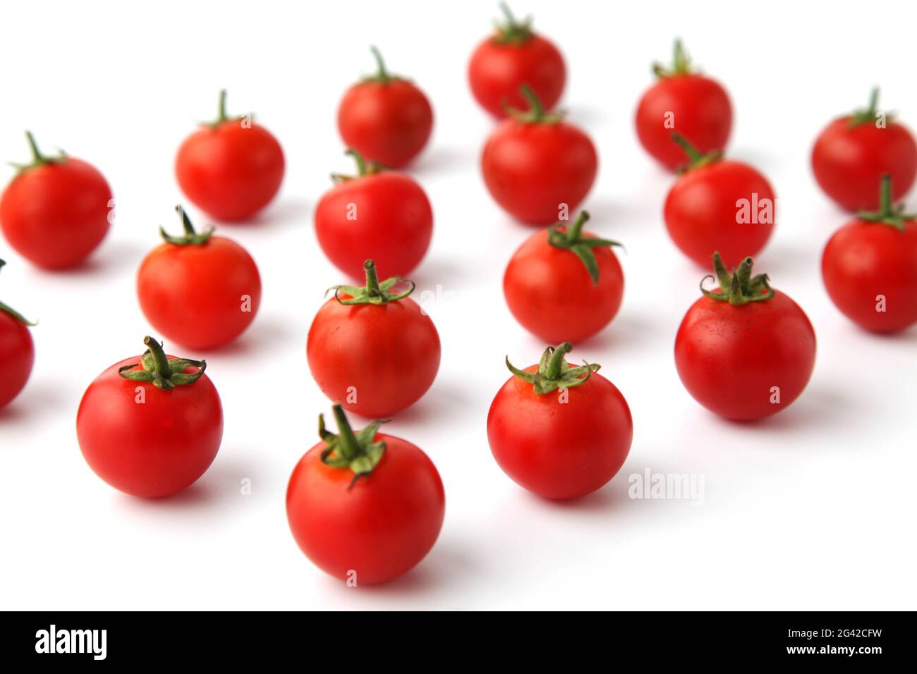 cherry tomatoes isolated on white background Stock Photo - Alamy