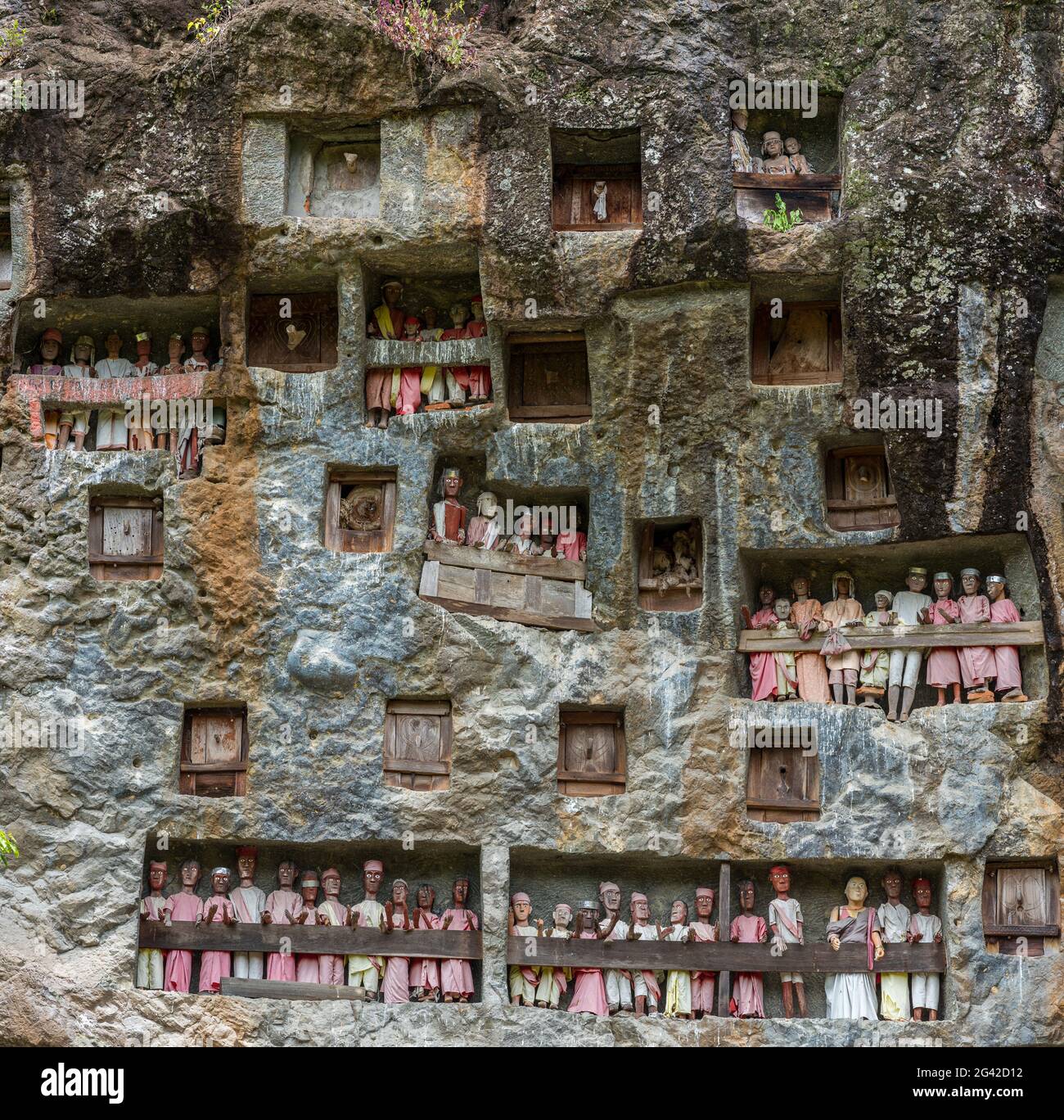 The rock tombs and galleries with Tau Tau of Lemo are a main attraction in Tana Toraja Stock Photo