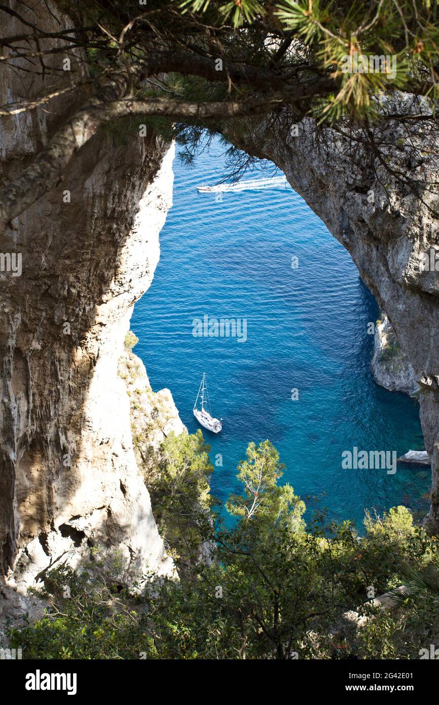 View at sea through the Arco Naturale in Capri, Italy Stock Photo