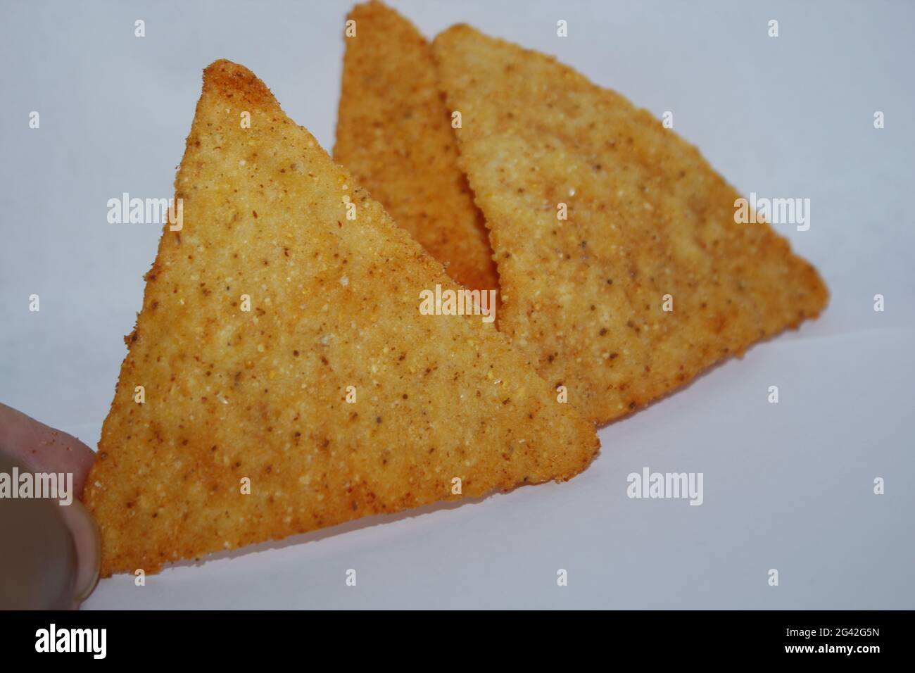 A group of Doritos chips on white background Stock Photo