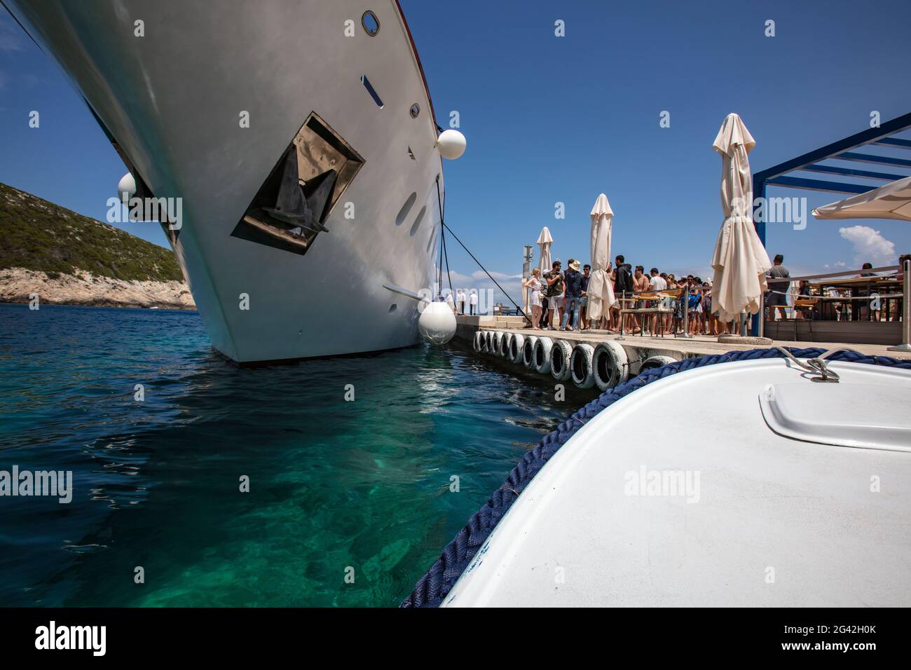 Front of excursion boat under the bow of cruise ship, near Vis, Vis, Split-Dalmatia, Croatia, Europe Stock Photo