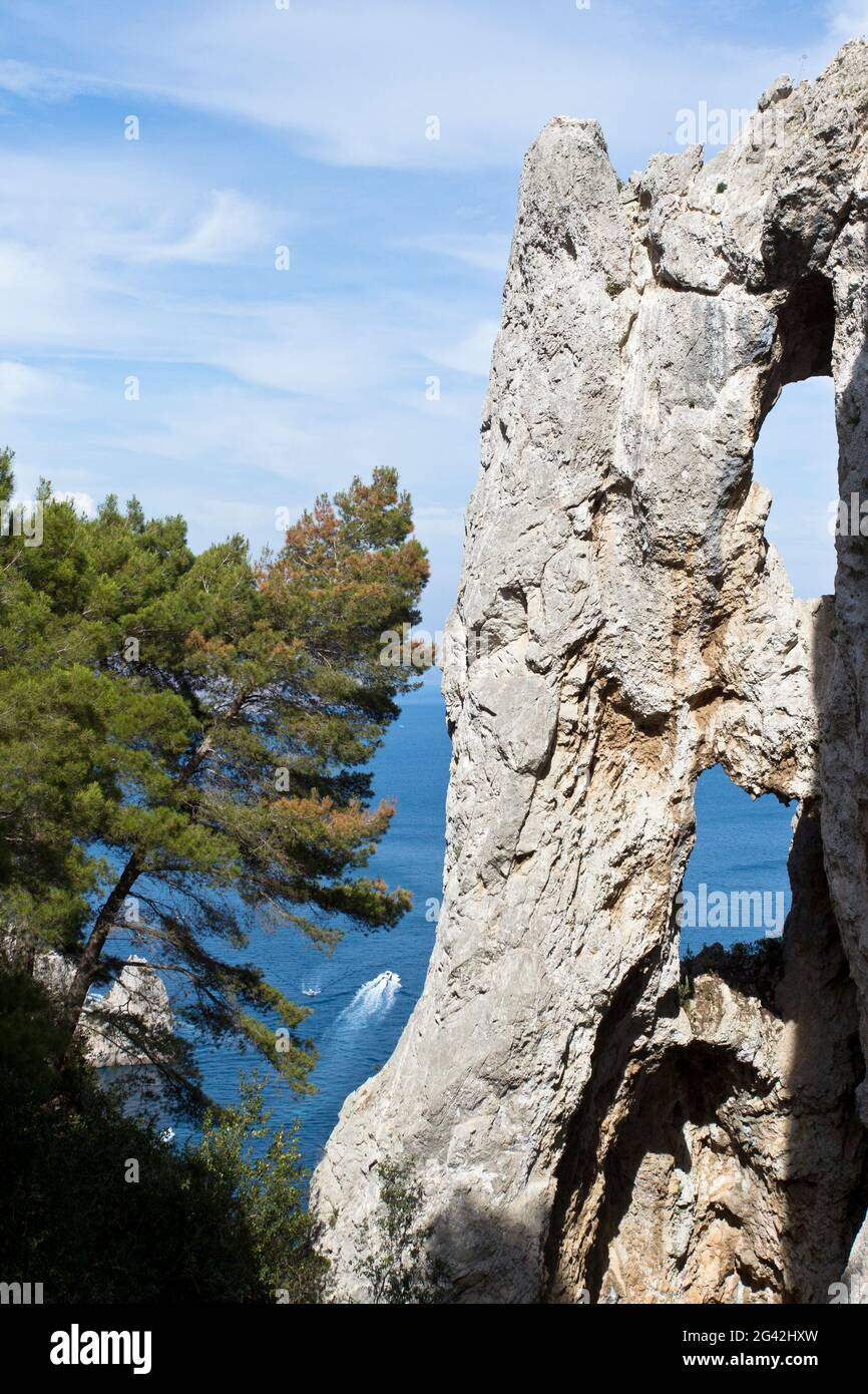 Detail of Arco Naturale and view at sea in Capri, Italy Stock Photo