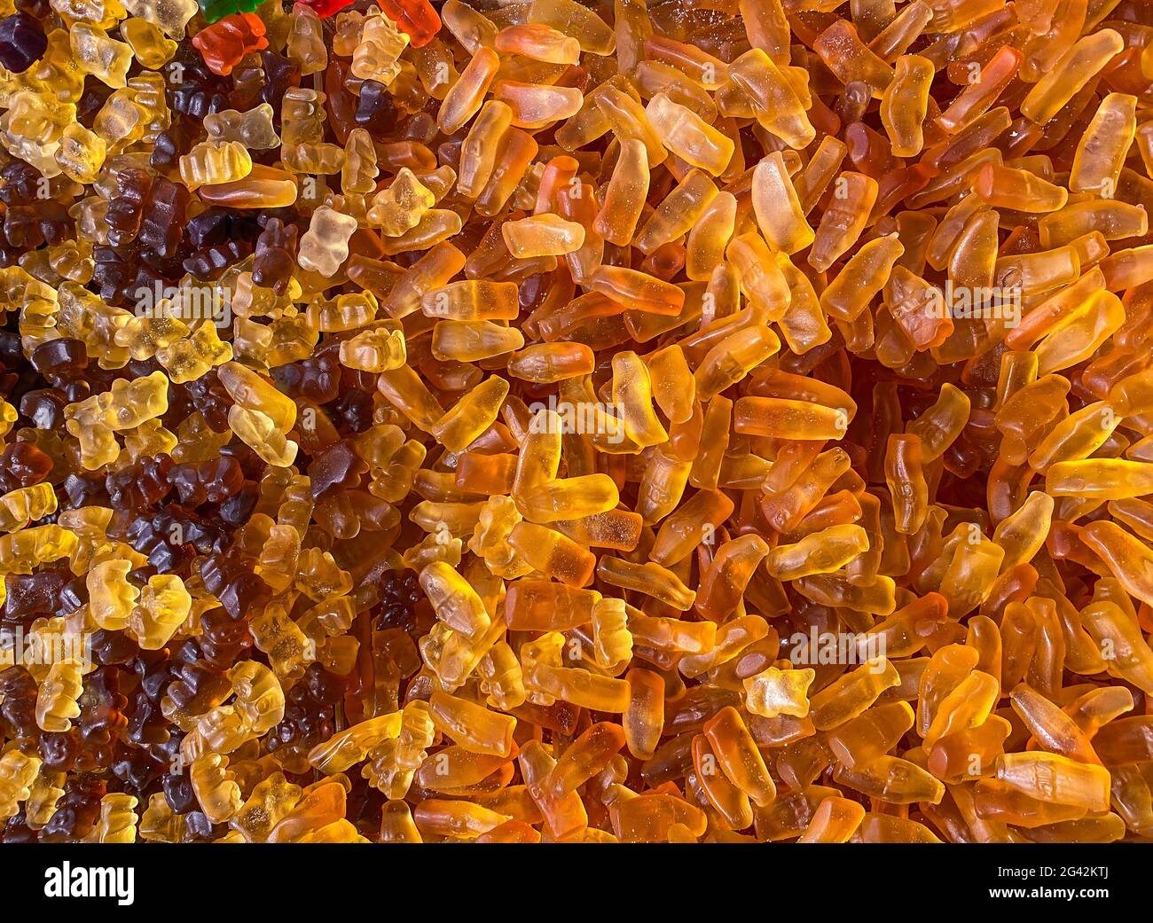 Delicious jelly bottles. Closeup a background from colorful sweets of