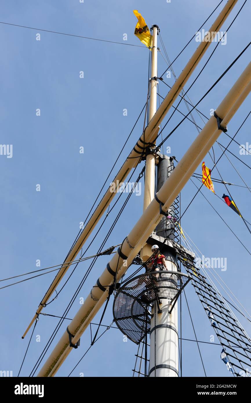 BRISTOL, UK - MAY 14 : Person climbing the rigging of the SS Great Britain in dry dock in Bristol on May 14, 2019. One unidentif Stock Photo