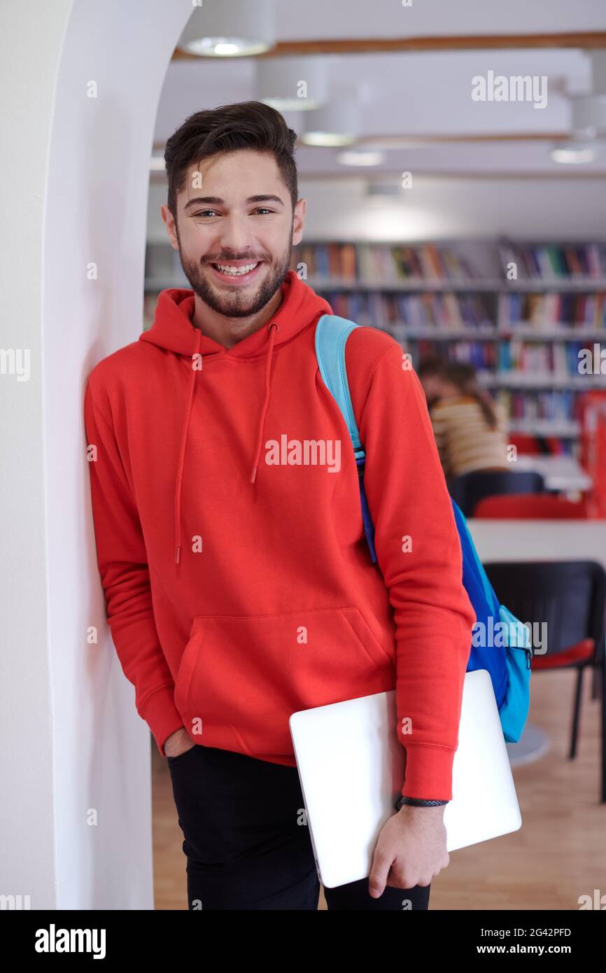 Student Using Hp Device The student uses a laptop and a school library Stock Photo - Alamy