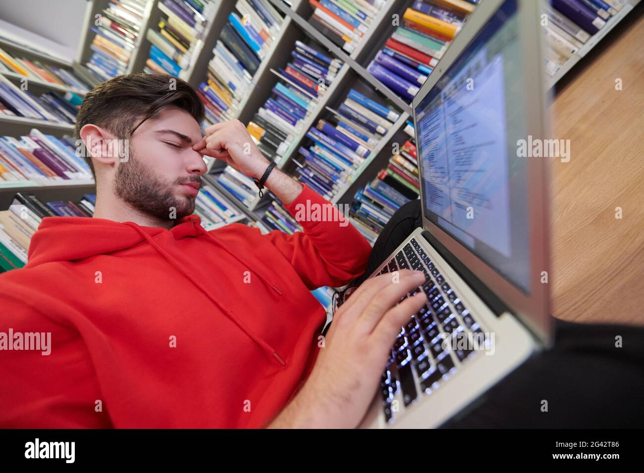Am Using Notebooks The students uses a notebook, laptop and a school library Stock Photo ...