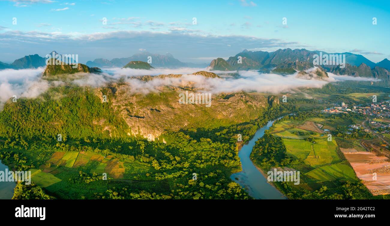 Aerial view of lush green mountain landscape of Vang Vieng, Laos Stock Photo