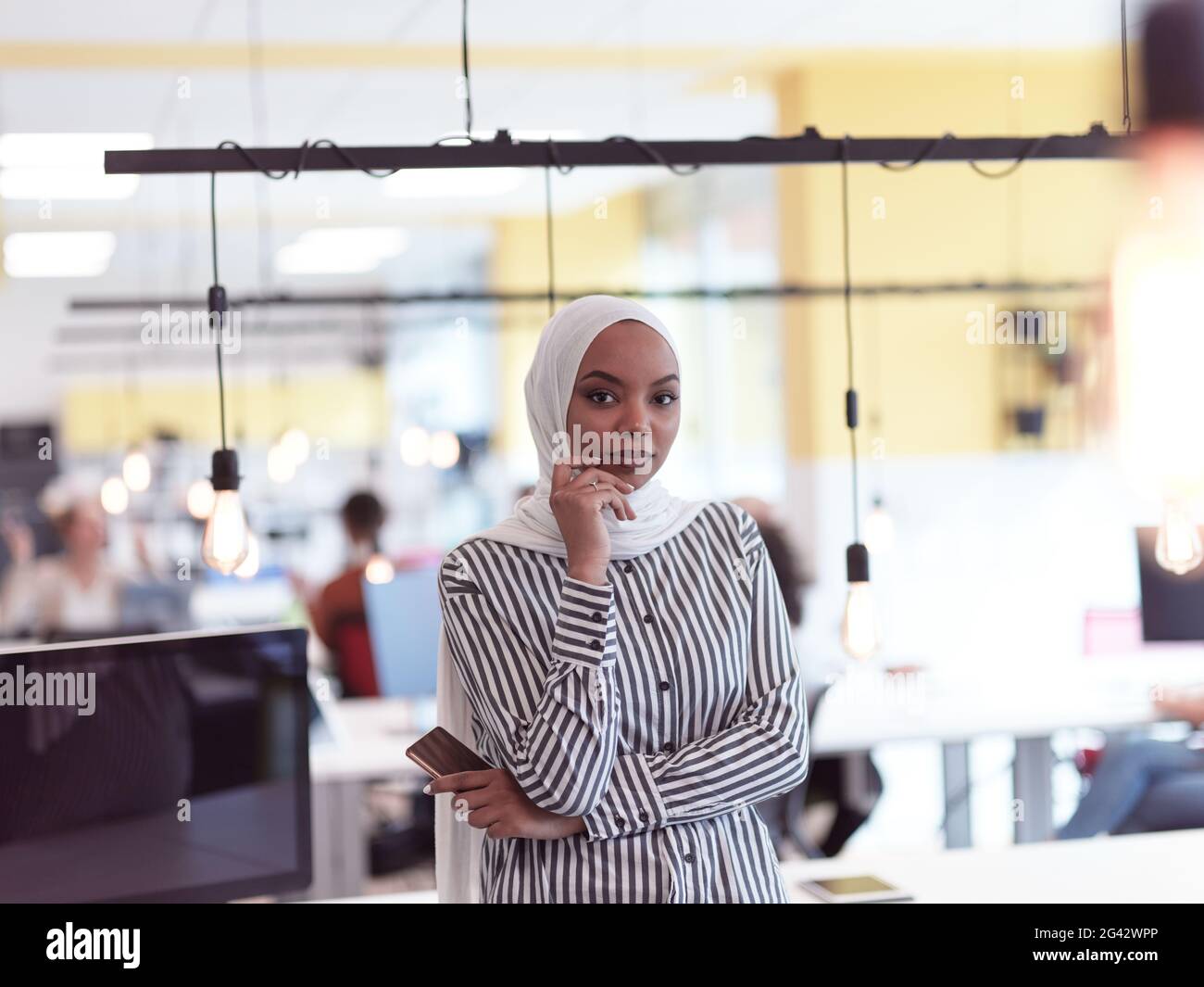 African muslim businesswoman portrait at office Stock Photo - Alamy