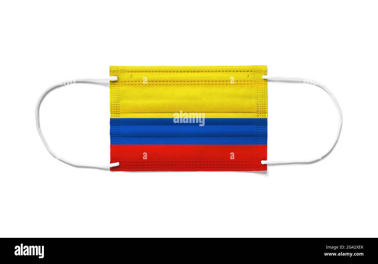 Flag of Colombia on a disposable surgical mask. White background Stock Photo