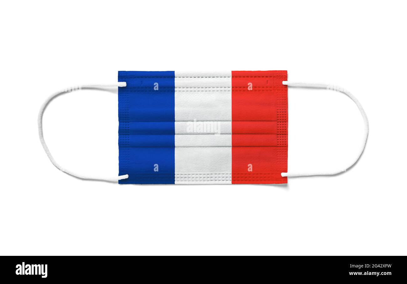 Flag of France on a disposable surgical mask. White background Stock Photo