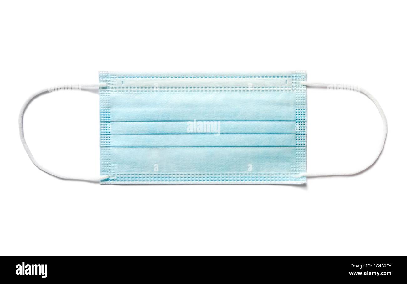 Disposable surgical mask isolated on white background Stock Photo - Alamy