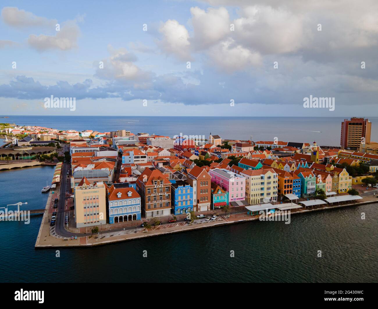 Willemstad, Curacao. Dutch Antilles. Colourful Buildings attracting tourists from all over the world. Blue sky sunny day Curacao Stock Photo