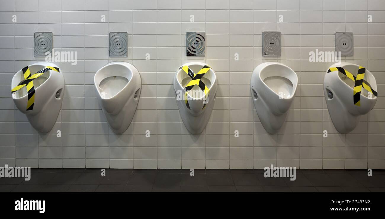 Urinal, Corona distance rule on the men's toilet, Bochum, North Rhine-Westphalia, Germany, Europe Stock Photo